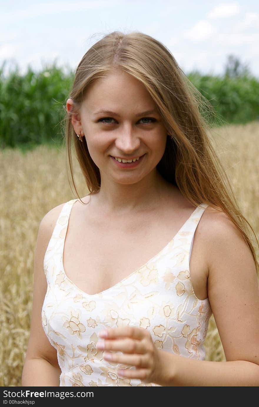 The girl in the middle of wheat. The girl in the middle of wheat