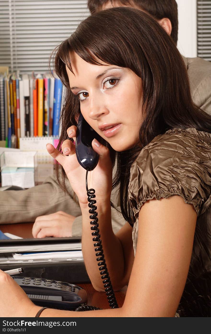 Group of business people working together in the office. Group of business people working together in the office.