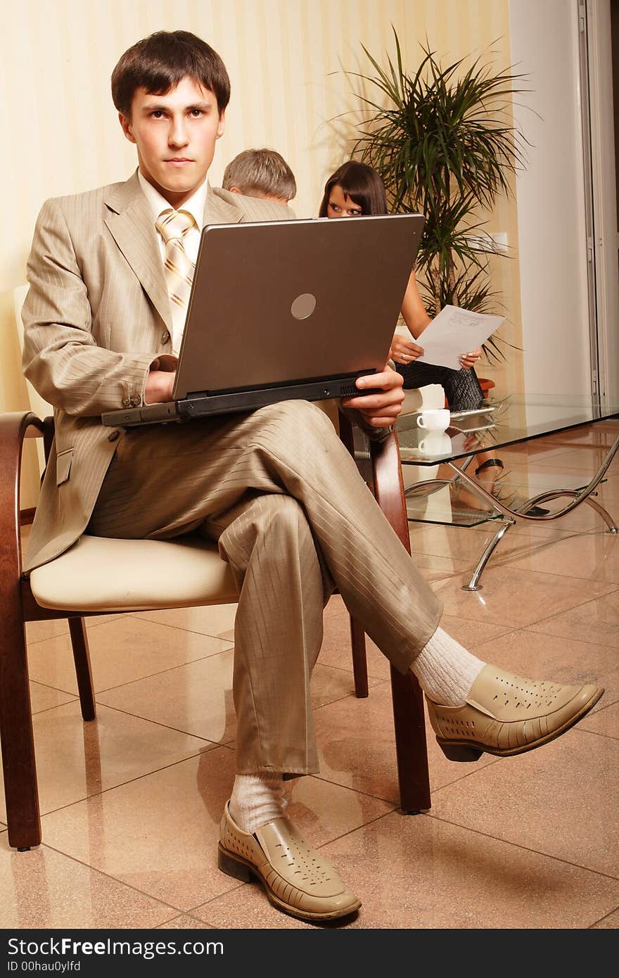 Group of business people working together in the office. Group of business people working together in the office.