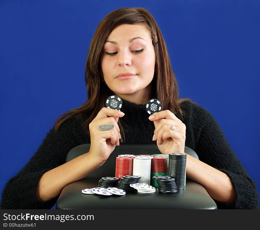 Arabian girl with a lot of poker chips. Arabian girl with a lot of poker chips