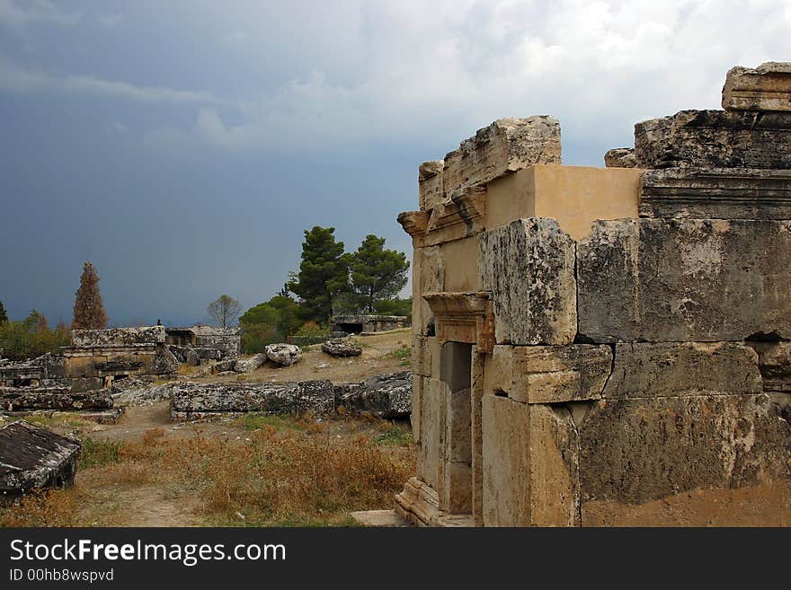 An ancient Roman necropolis, Turkey, peak of Pamukkale mountain. Shortly before thunderstorm