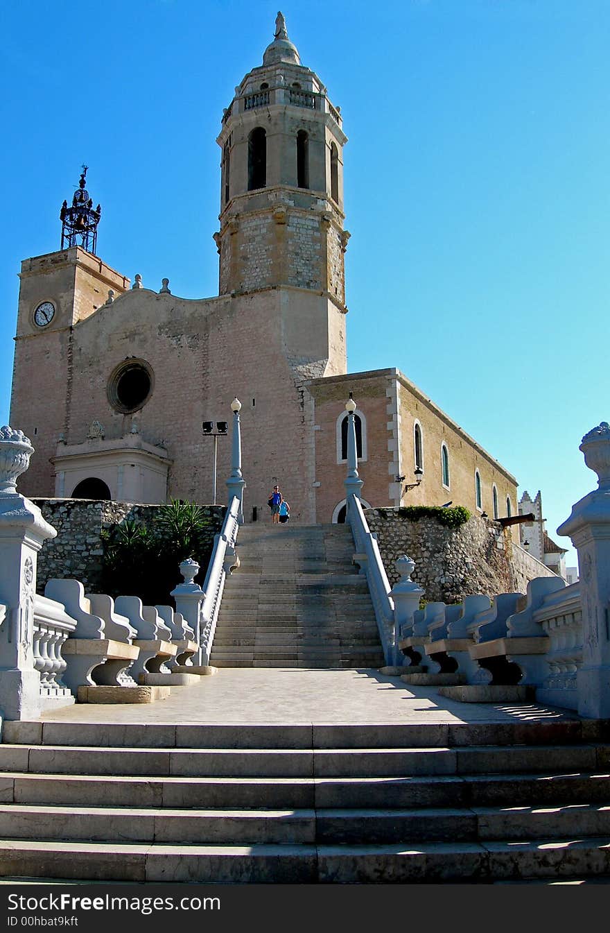 View up stairs to seaside church on clear blue sky. View up stairs to seaside church on clear blue sky