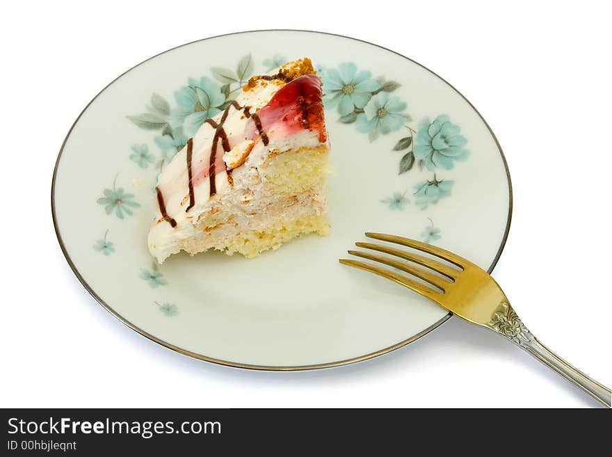 Cake on plate and fork, isolated on white background