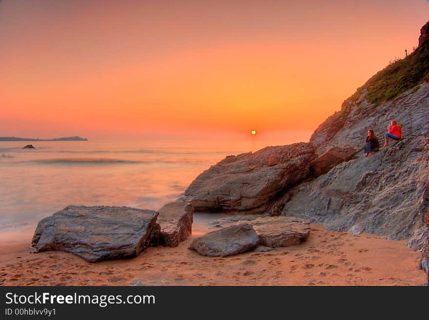 Sunset by the ocean