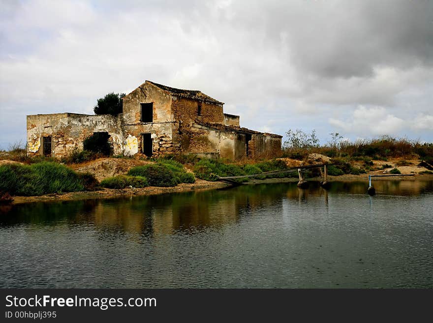 A old fisherman house near the small lake. A old fisherman house near the small lake