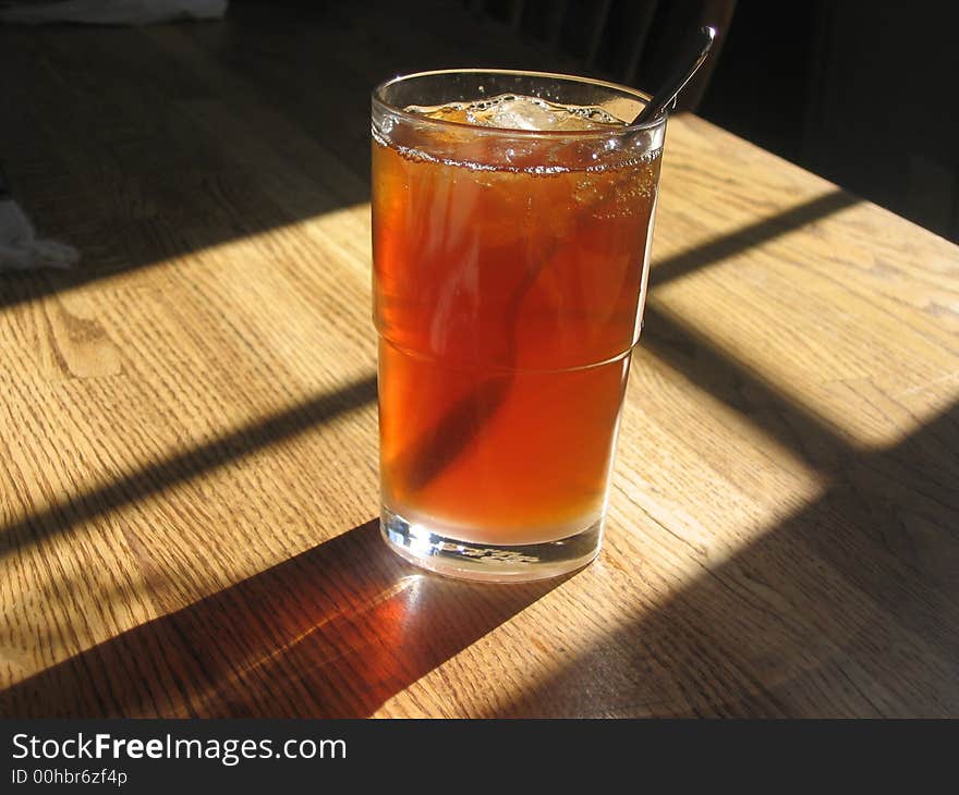 Iced tea in light of the sun