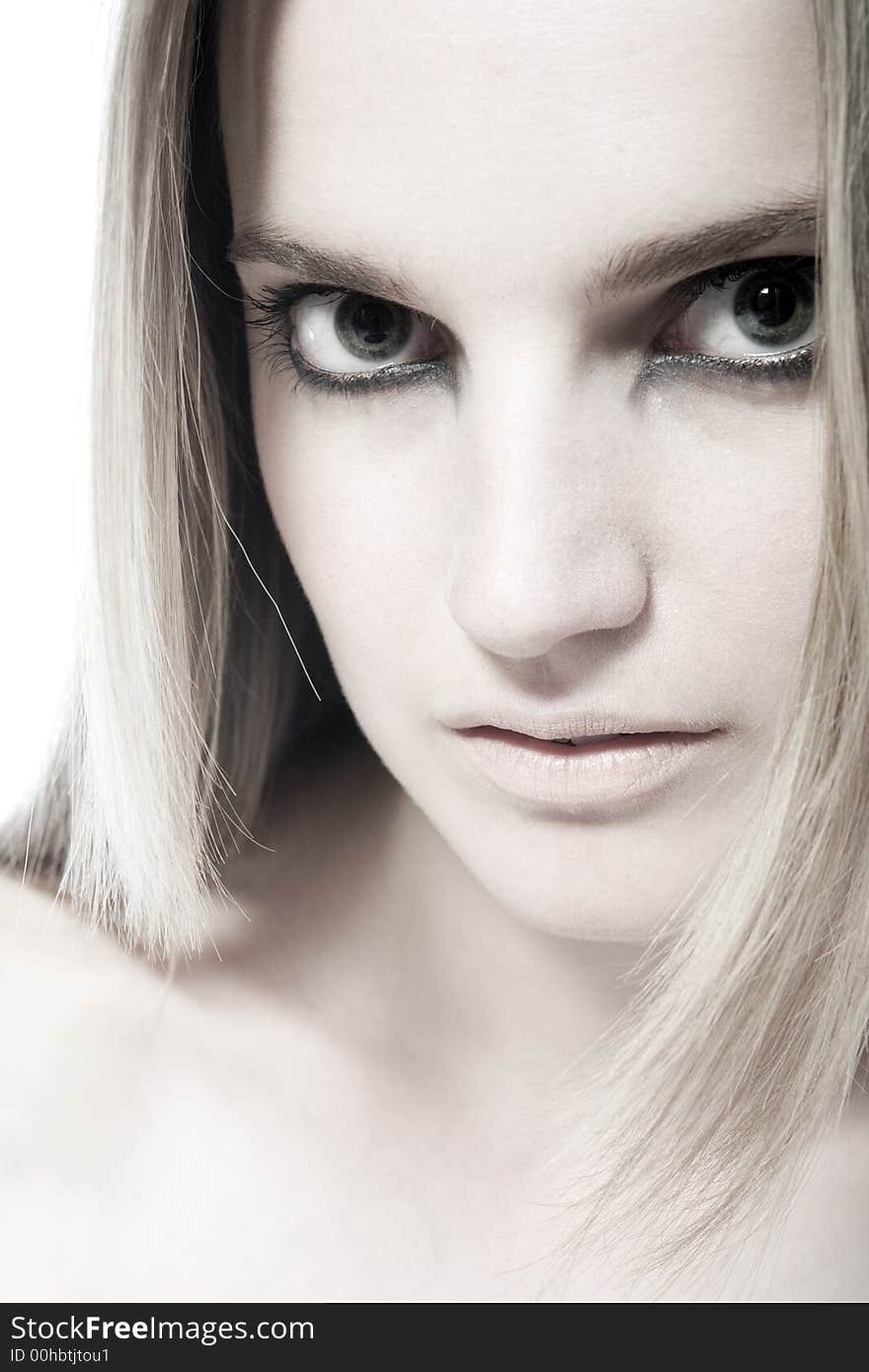 A beauty girl on a white background in the studio. A beauty girl on a white background in the studio