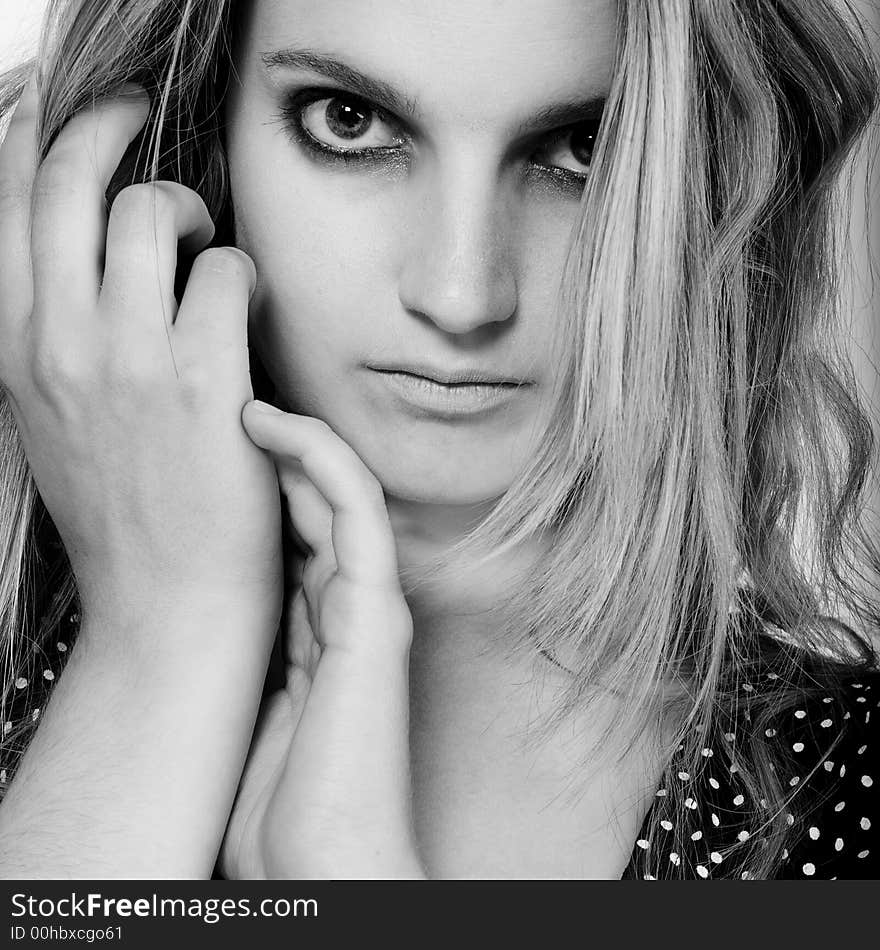 A beauty girl on a white background in the studio. A beauty girl on a white background in the studio