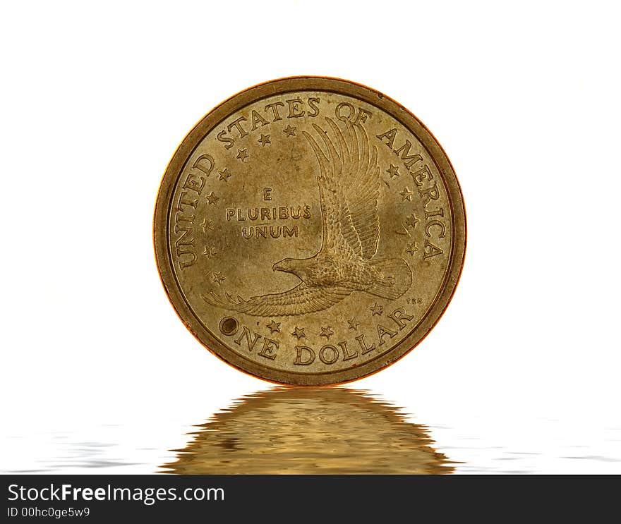 One American Dollar coin isolated on white background. One American Dollar coin isolated on white background