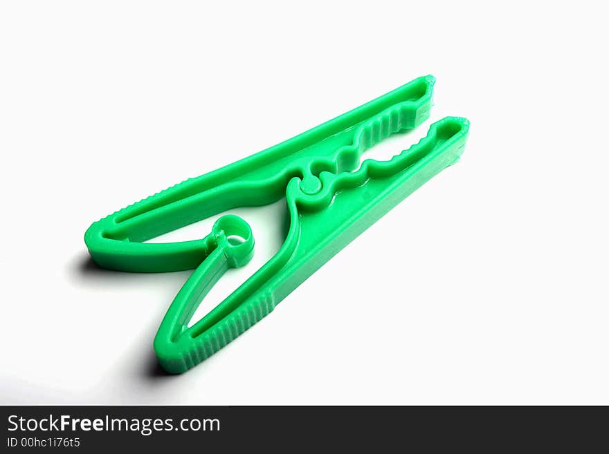 Green Washing Peg isolated on a white background