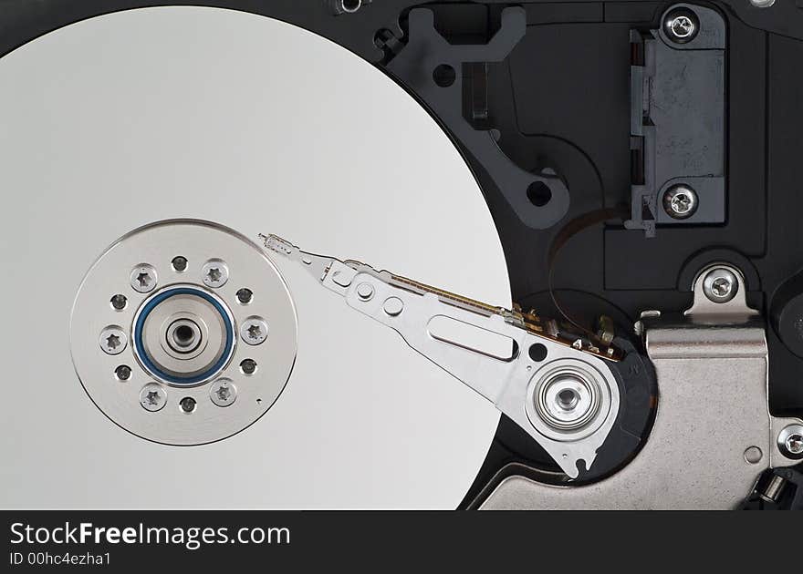 A close up of the internal mechanism of a hard drive.