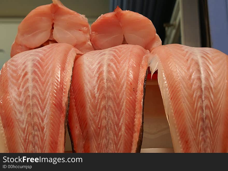 Sliced tasty fresh kingfish in the marketplace