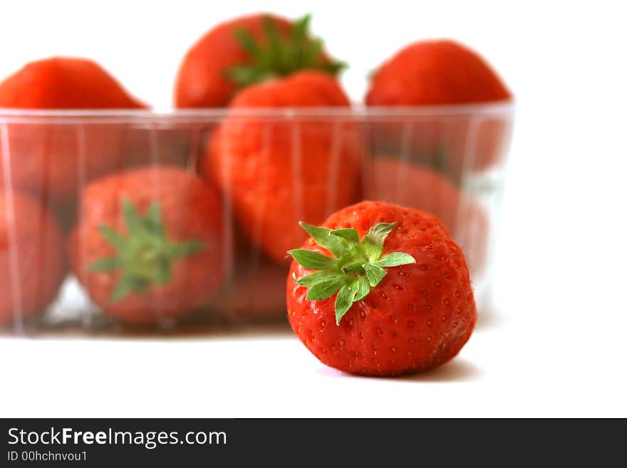 Strawberry in the dish isolated on white