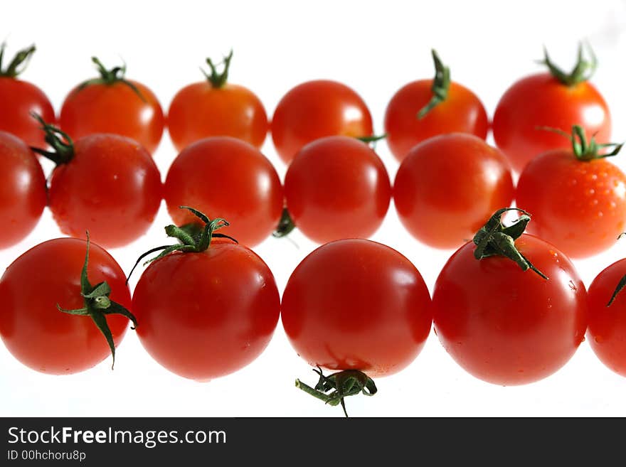 Three Row Of Wet Cherry Tomato