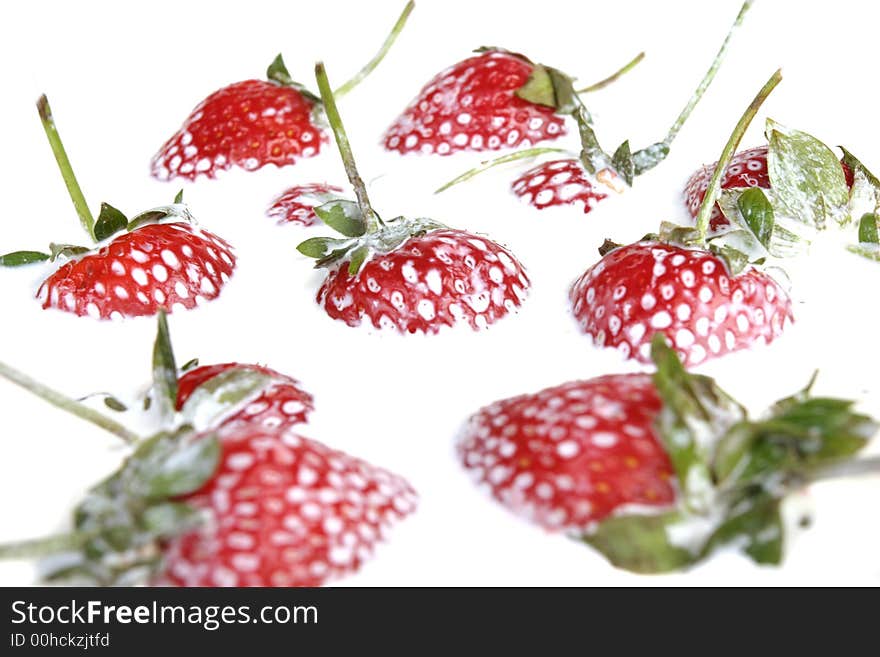 Red strawberries with cream in crockery. Red strawberries with cream in crockery