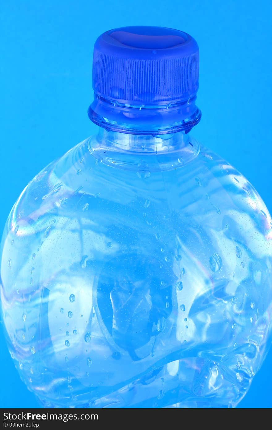 Mineral water in a blue bottle