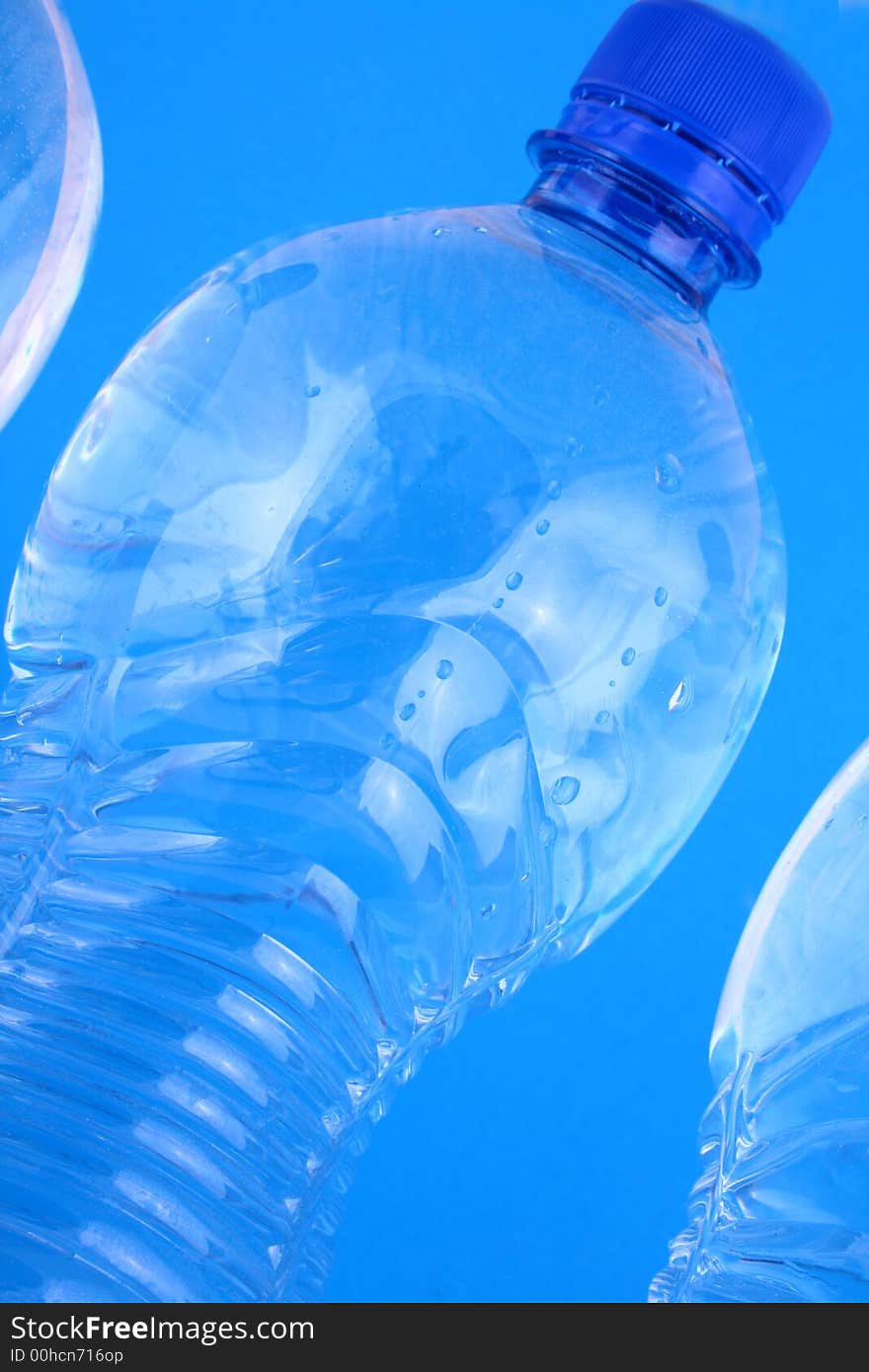 Mineral water in blue bottles