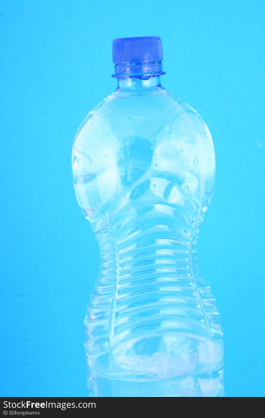 Mineral water in a blue bottle