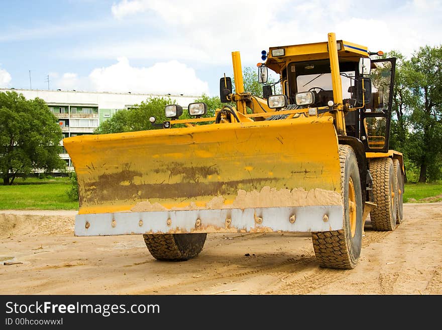 Bulldozer. Close up shot. Outdoors.