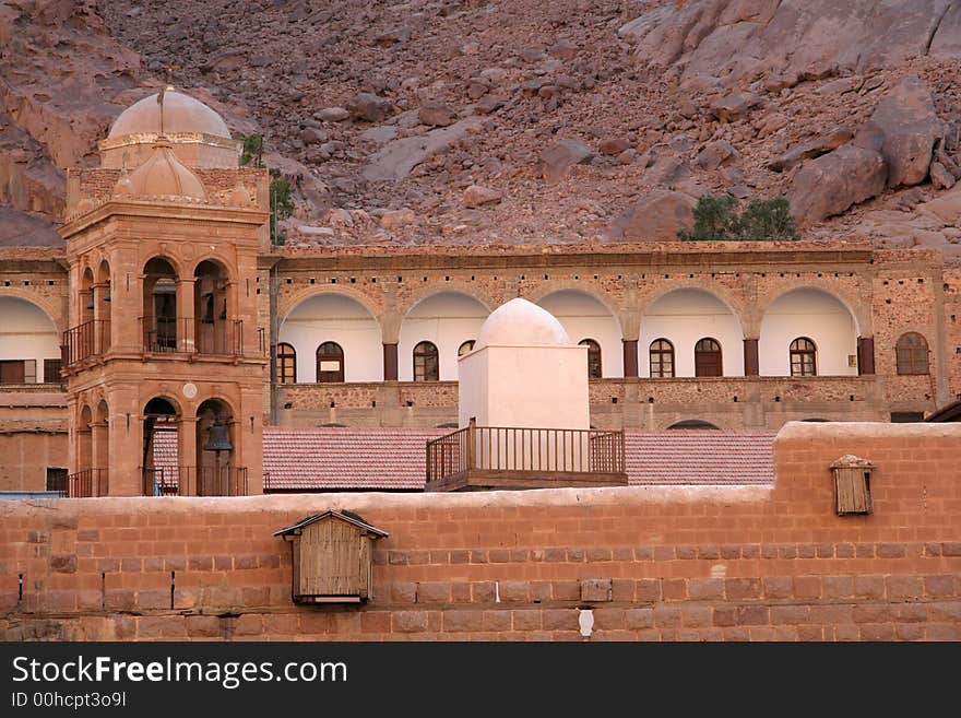 Bell-tower of orthodox church and minaret of mosque in the monastery of Saint Catherine, Sinai, Egypt. Bell-tower of orthodox church and minaret of mosque in the monastery of Saint Catherine, Sinai, Egypt