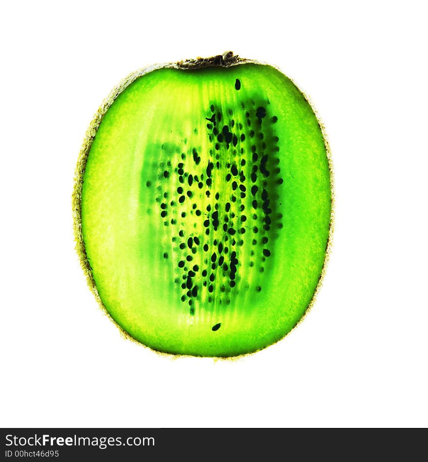 Backlit kiwi fruit slice on a white background with clipping path. Backlit kiwi fruit slice on a white background with clipping path