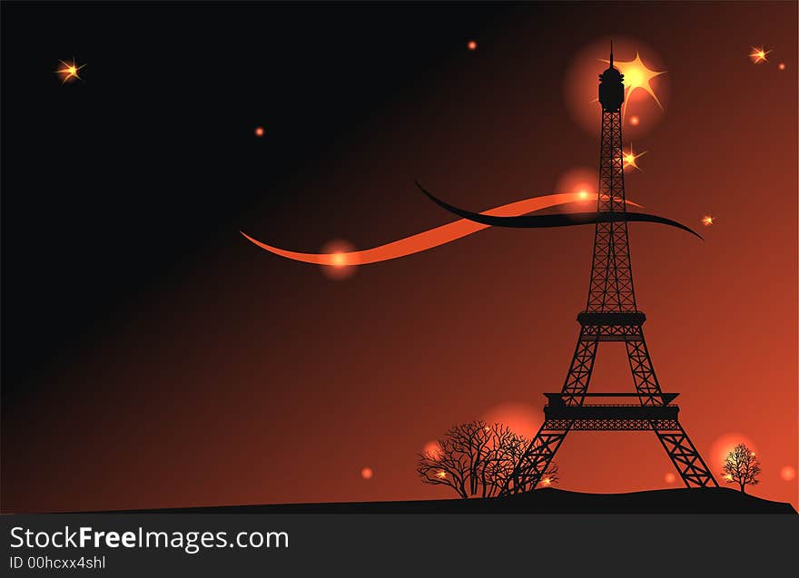 Silhouette of the Eiffel Tower against an evening sky