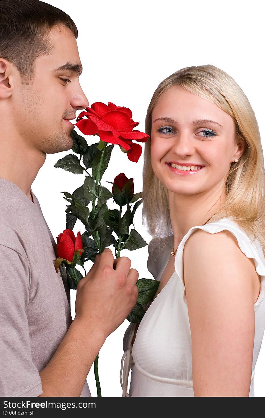 The guy, girl and a rose on white background. The guy, girl and a rose on white background