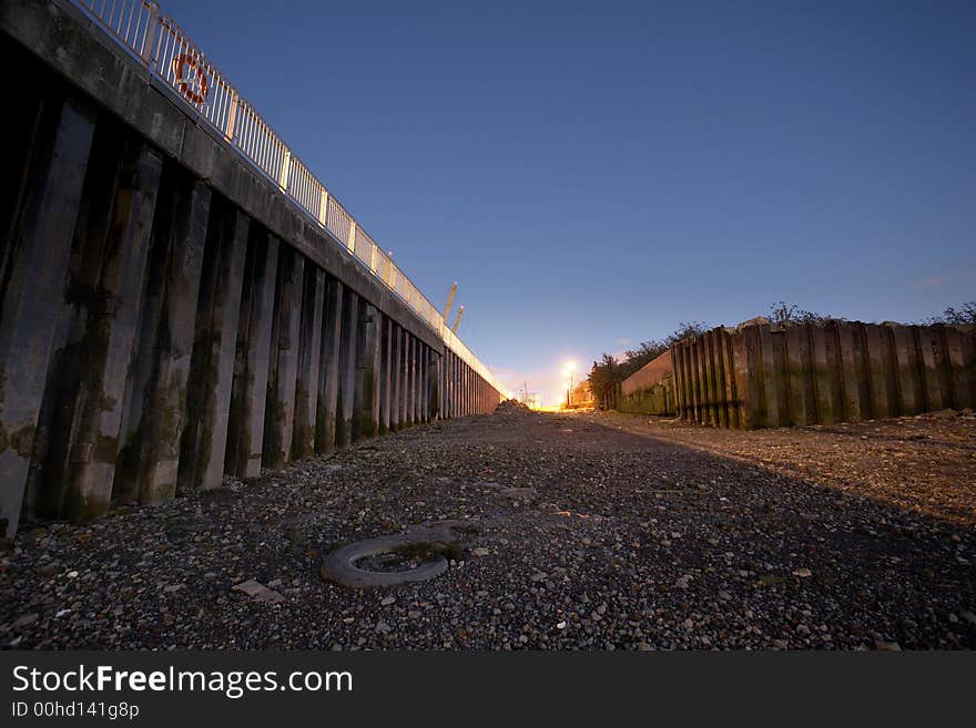 Thames riverbank at night showing the wharf