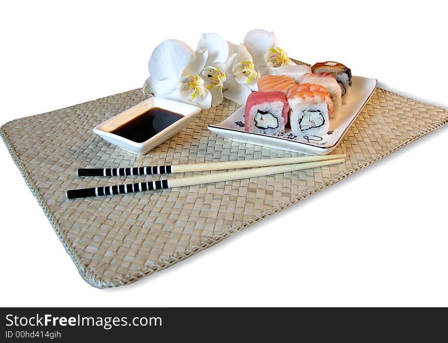 Rolls on bamboo mat. The Japanese meal