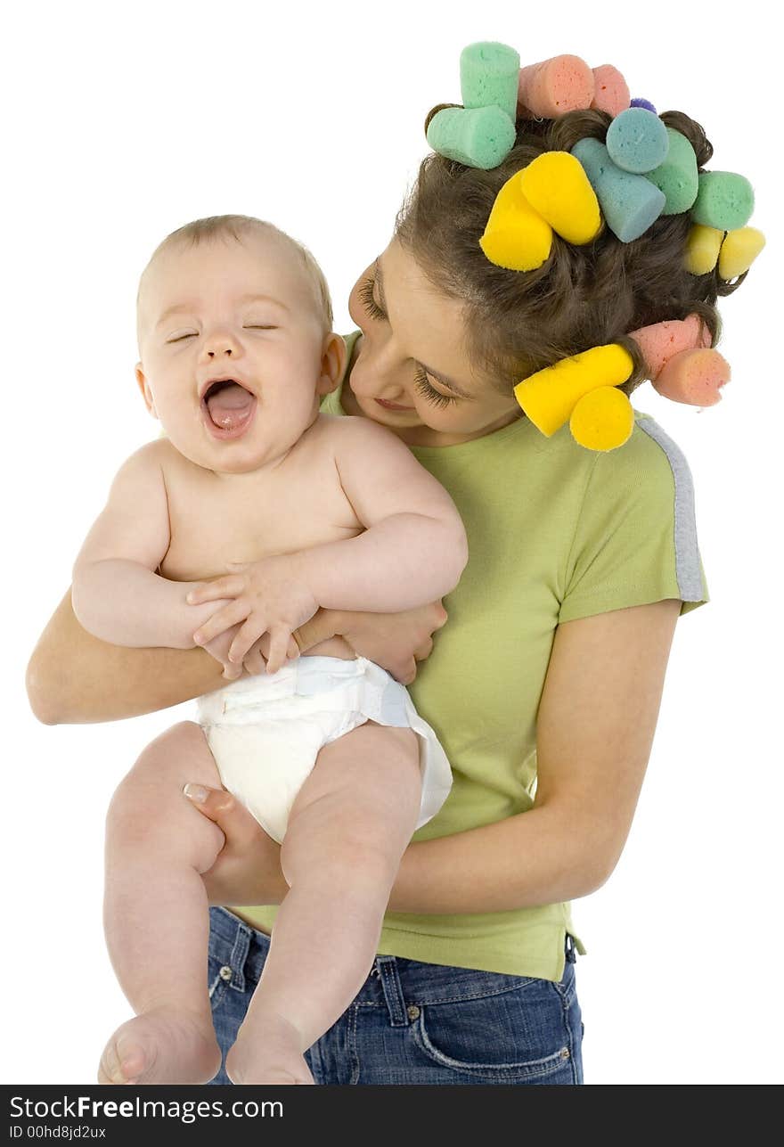 Young, beautiful woman with baby on hands. Hugging baby and smiling. Baby is laughing, white background. Front view. Young, beautiful woman with baby on hands. Hugging baby and smiling. Baby is laughing, white background. Front view