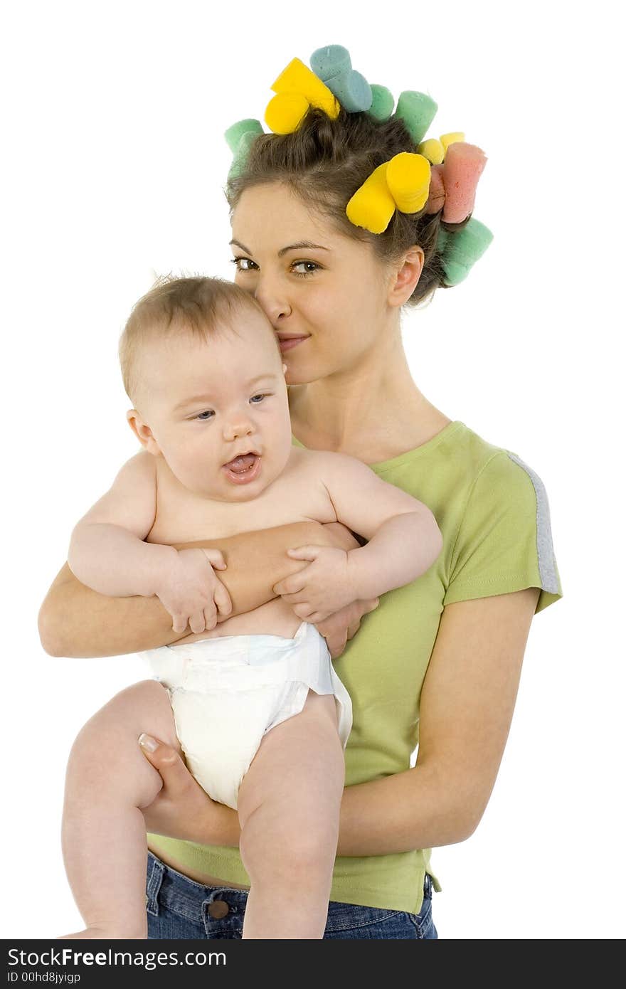 Young, beautiful woman with baby on hands. Hugging baby and smiling. Looking at camera, white background. Young, beautiful woman with baby on hands. Hugging baby and smiling. Looking at camera, white background