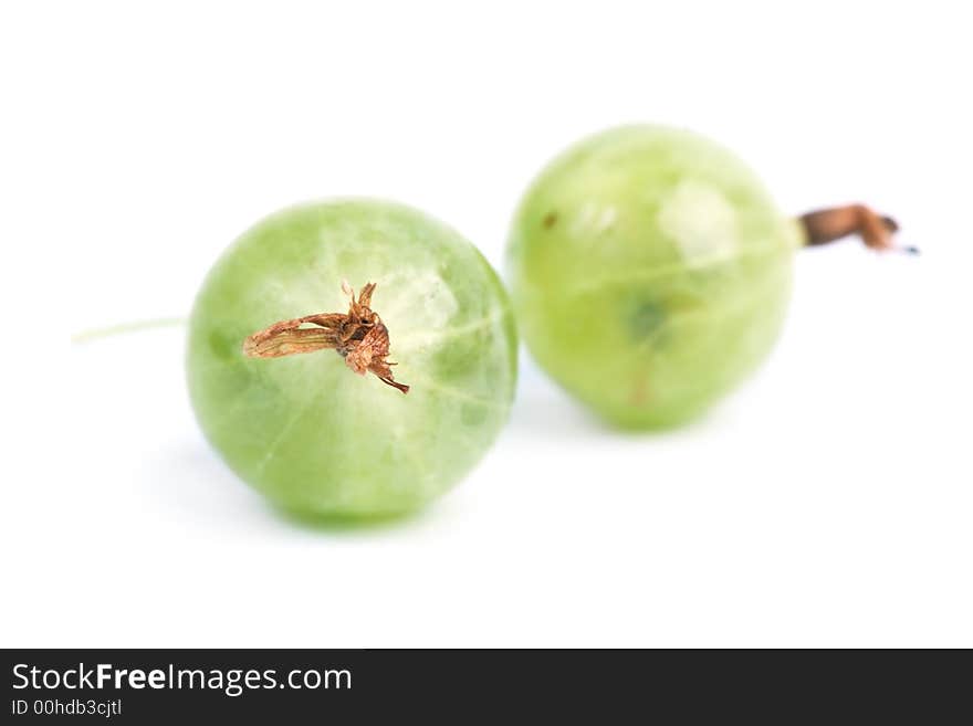 Two green gooseberrys. Isolated white. Two green gooseberrys. Isolated white.