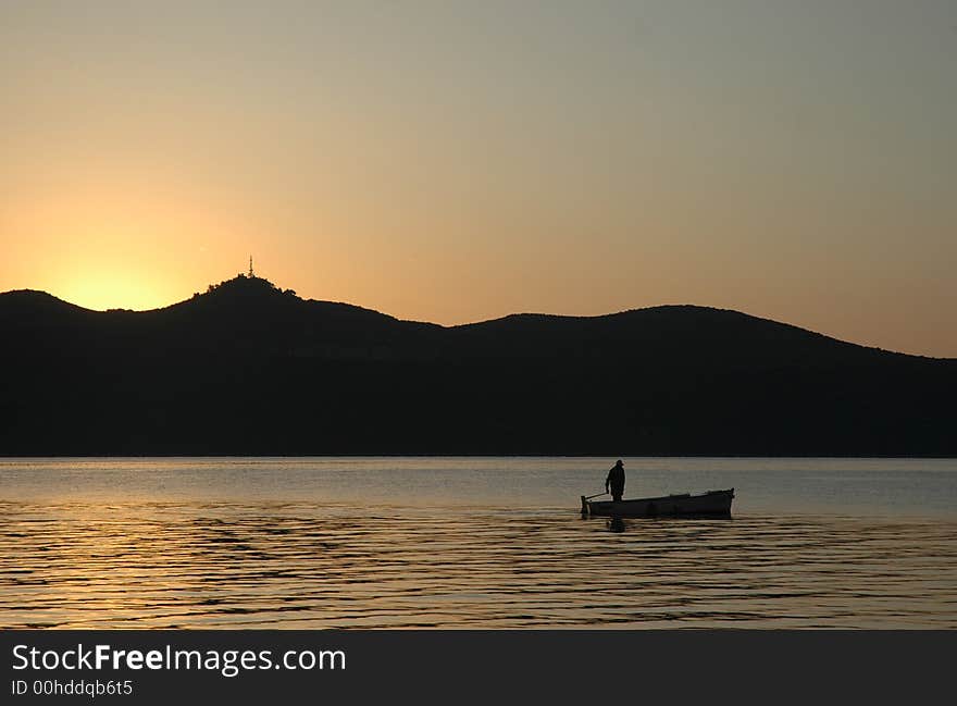 Fisherman before sunrise