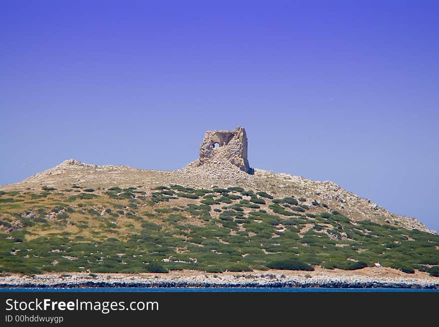 A little island whit an ancient tower ruins near isola delle femmine (PA) Sicily. A little island whit an ancient tower ruins near isola delle femmine (PA) Sicily