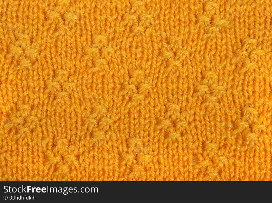 The pattern of a product from a wool in the form of a background. The pattern of a product from a wool in the form of a background