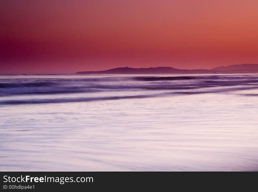 Impressionistic view of the sea in evening light. Impressionistic view of the sea in evening light