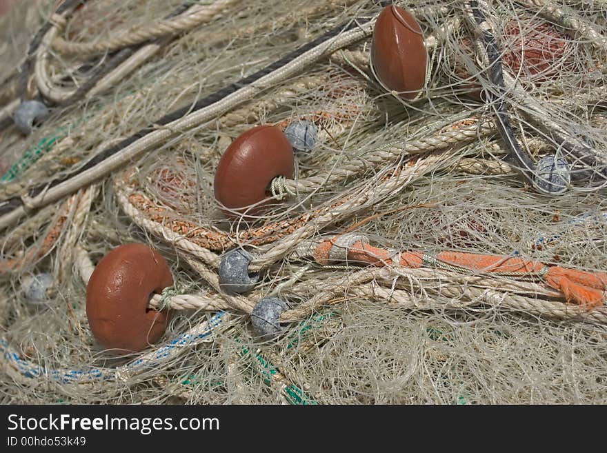 Fishing net to fish posed on the quay