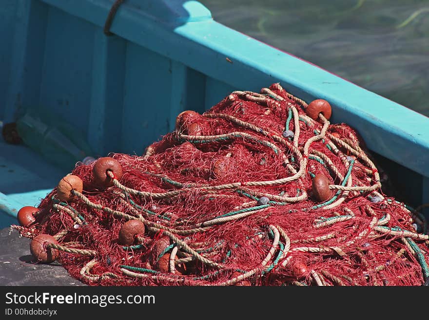 Fishing net to fish posed on the quay