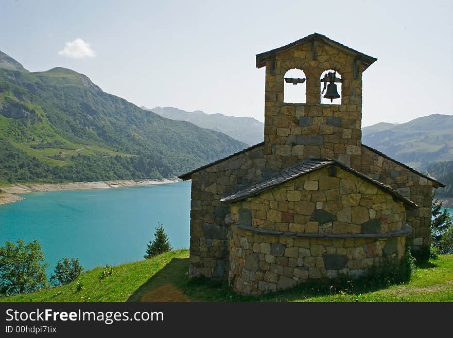 Old church at the edge of a lake in mountain. Old church at the edge of a lake in mountain