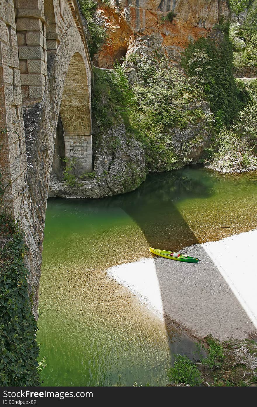 Canoe at the edge of a river with its
paddles. Canoe at the edge of a river with its
paddles