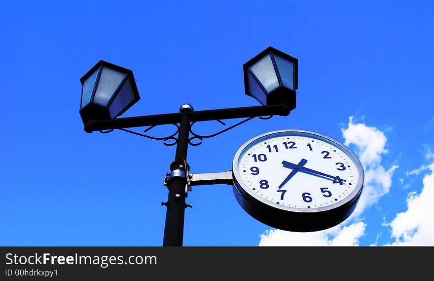 The most widespread measuring device - hours on a background of the bright dark blue sky. The most widespread measuring device - hours on a background of the bright dark blue sky.