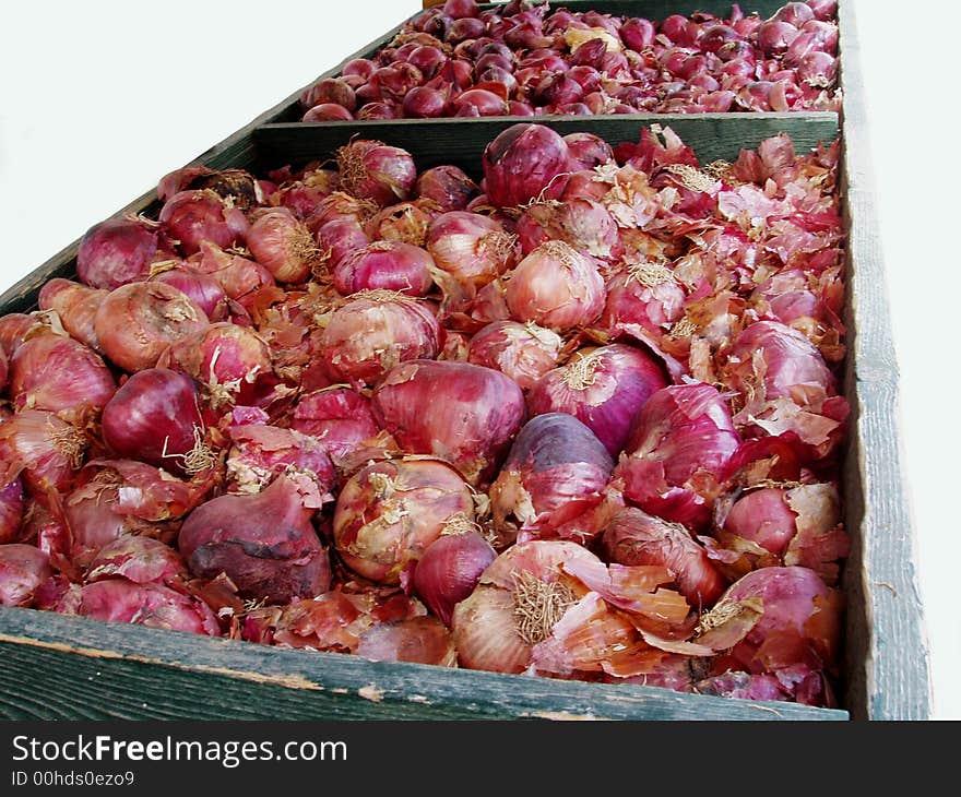 Onions in boxes for sale