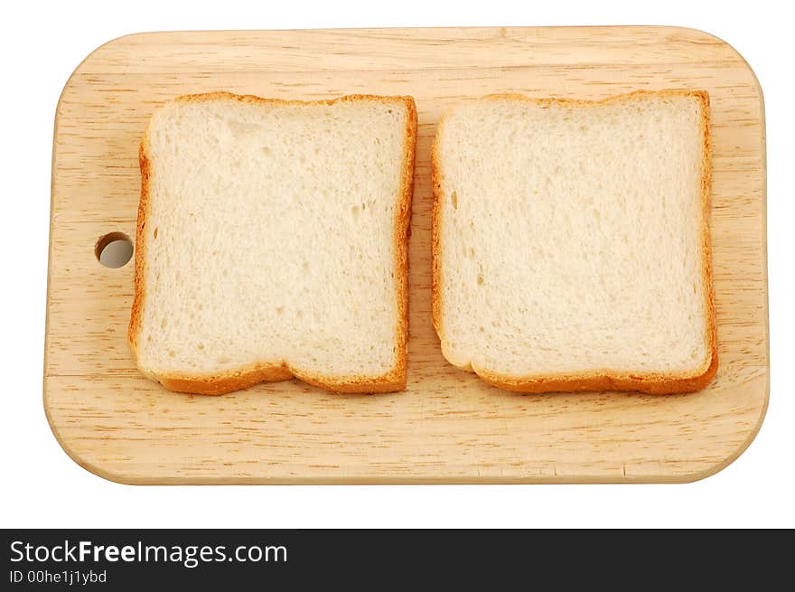 Two pieces toast bread on a cutting board isolated over white background