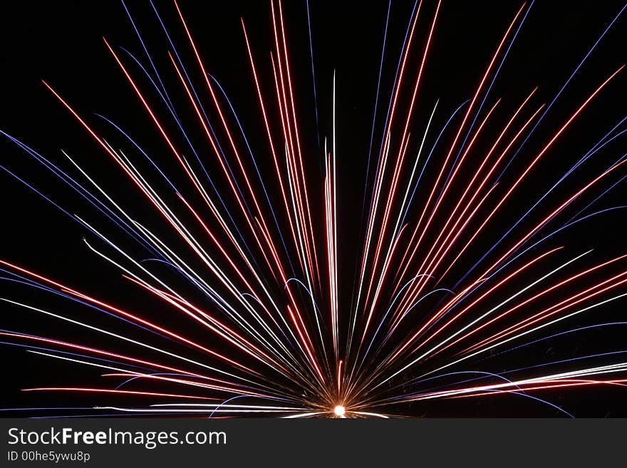 An image of exploding fireworks at night.