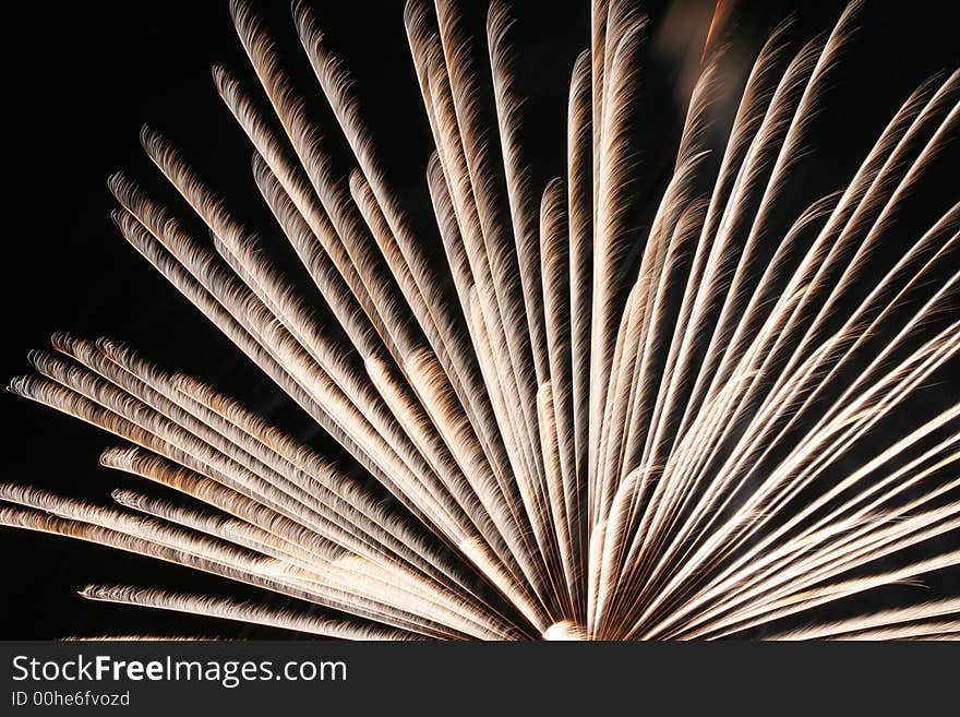 An image of exploding fireworks at night.