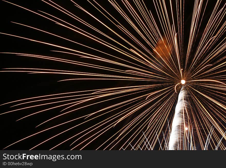 An image of exploding fireworks at night.