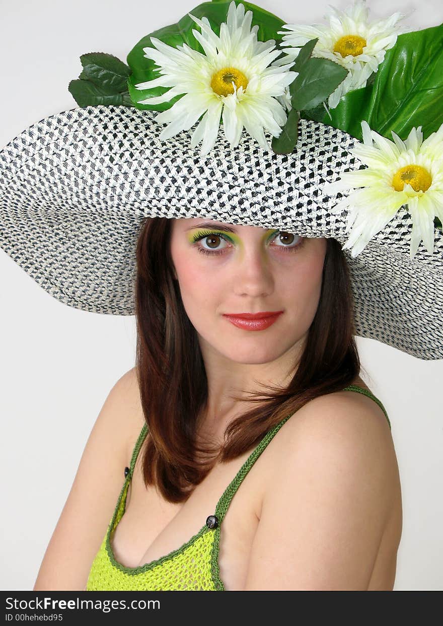 Girl with flowers in her hat