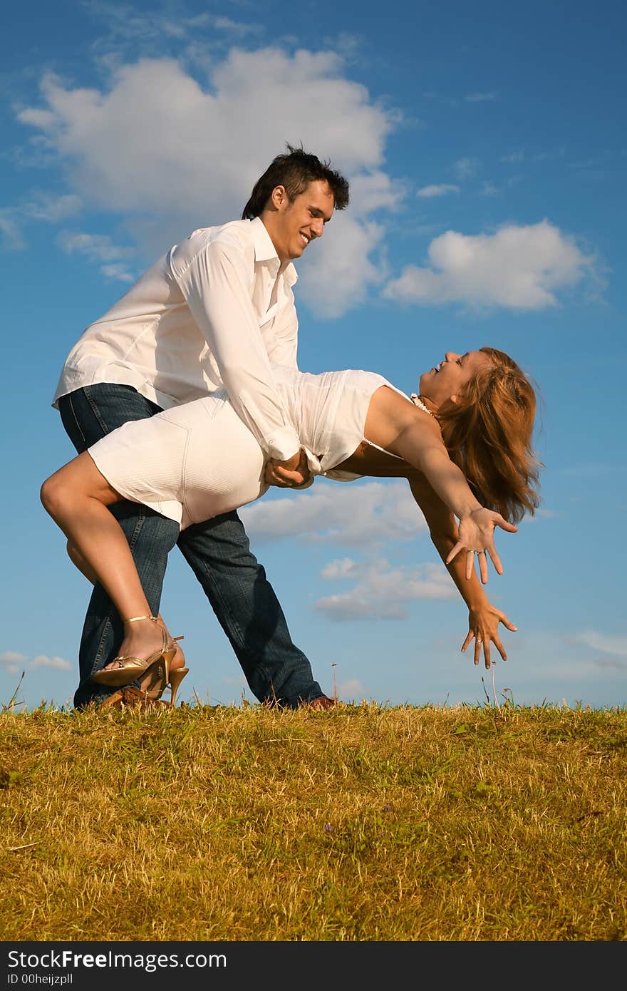 Man holds the young woman. Man holds the young woman