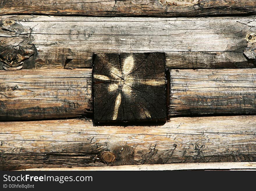 Logs in the wall of old russian izba in Suzdal (Russia)