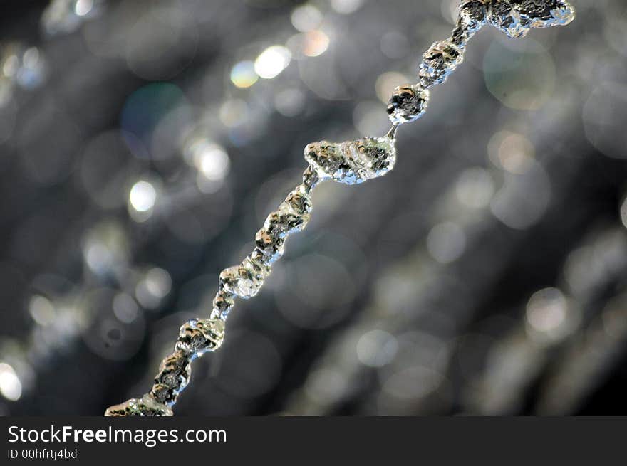 Water flowing from a fountain photgraphed at at very high shuter speed. Water flowing from a fountain photgraphed at at very high shuter speed